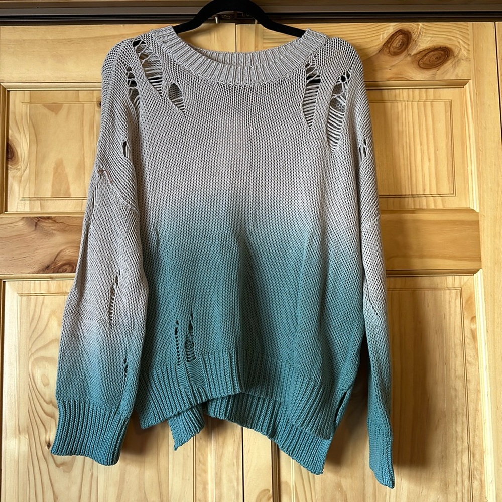 Distressed sweater